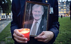 A woman holds a framed picture of Sir David Amess with a candle (Photo by Tejas Sandhu / SOPA Images/Sipa USA) A woman holds a framed picture of Sir David Amess with a candle (Photo by Tejas Sandhu / SOPA Images/Sipa USA)