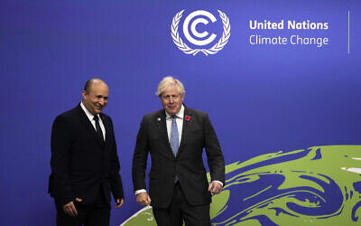Prime Minister Boris Johnson (right) greets Israel's Prime Minister Naftali Bennett at the Cop26 summit at the Scottish Event Campus (SEC) in Glasgow. Picture date: Monday November 1, 2021.