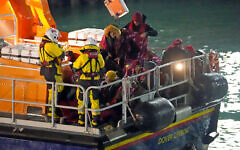 A group of people thought to be migrants are brought in to Dover, Kent, by the RNLI, following a small boat incident in the Channel after 27 people died in the worst-recorded migrant tragedy in the Channel. Picture date: Thursday November 25, 2021. A group of people thought to be migrants are brought in to Dover, Kent, by the RNLI, following a small boat incident in the Channel after 27 people died in the worst-recorded migrant tragedy in the Channel. Picture date: Thursday November 25, 2021.