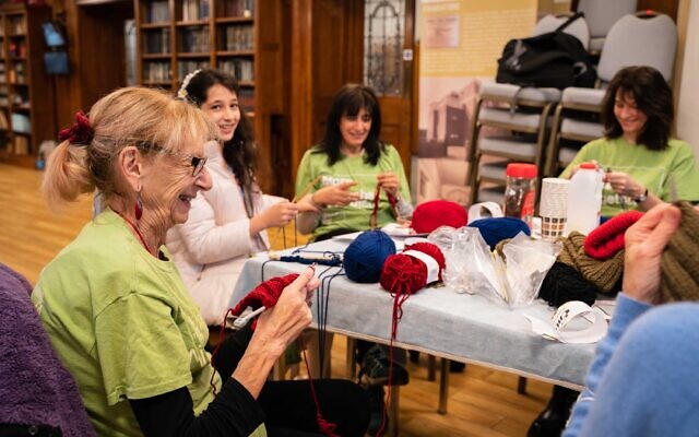 Day of activities at Golders Green Synagogue including knitting for the homeless and planting a tree