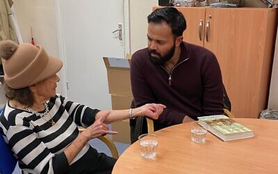 Survivor Lily Ebert, 97, shows Azeem Rafiq her tattoo from Auschwitz.
