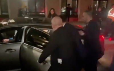 Screenshot from a video shows Tzipi Hotovely being rushed into a car