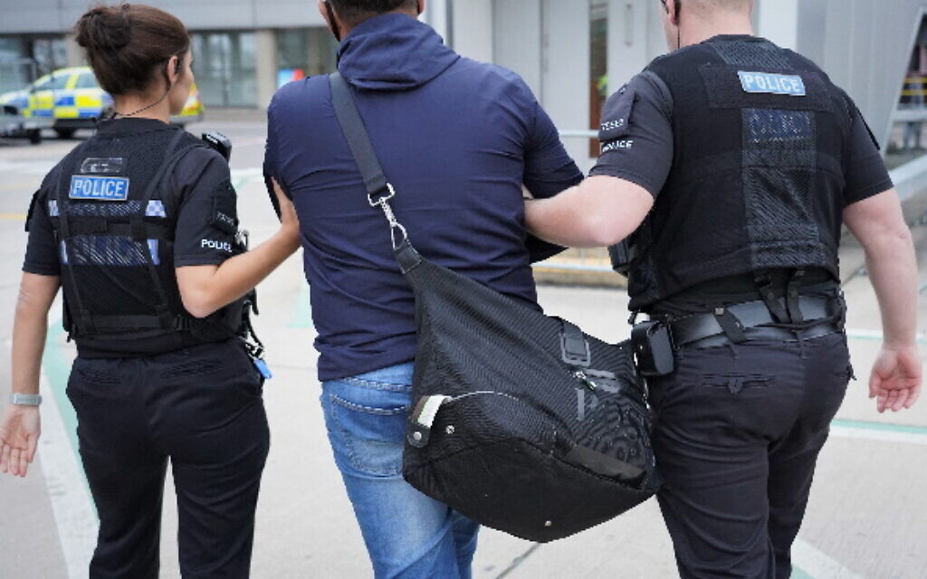 Essex Police image of West Ham supporter being arrested over alleged antisemitic chanting