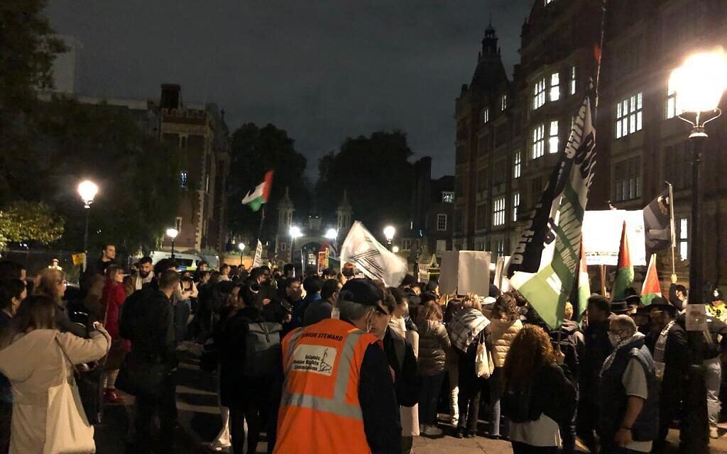 Protestors swarm the car of Israel
