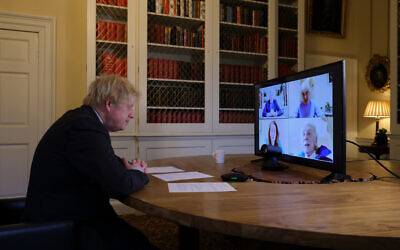 Boris Johnson virtual meeting with Holocaust Survivor Renee Salt and Liberator Ian Forsyth,  in the study of No10 Downing Street. Picture by Andrew Parsons / No 10 Downing Street
