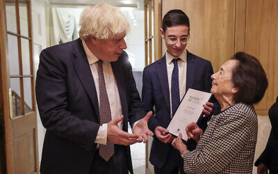 Prime Minister, Boris Johnson meets Holocaust survivor, Lily Ebert while hosting a Chanukah reception with the Chief Rabbi, Ephraim Mirvis, Israeli Foreign Minister  Yair Lapid . ( Picture by Tim Hammond / No 10 Downing Street)