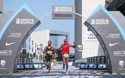 Avi Solomon crosses the finish line in Abu Dhabi