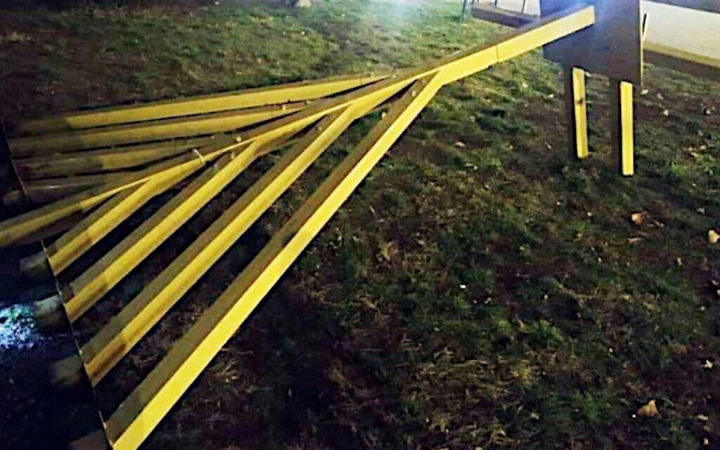A Chanukah  menorah that had been knocked to the ground lies flat in Kyiv on Nov. 30, 2021. (The Ukrainian Jewish Committee)