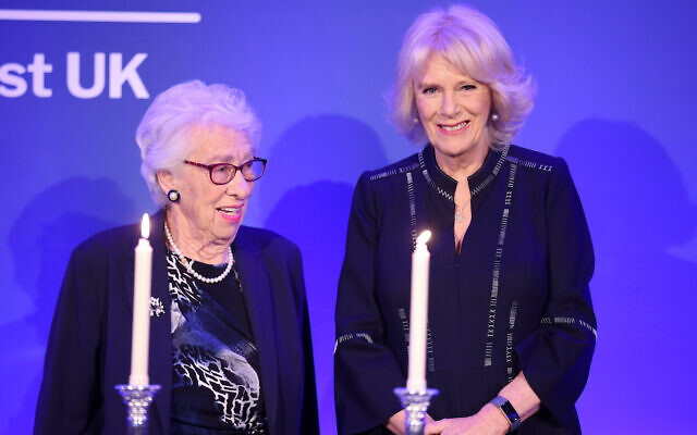 Eva Schloss MBE, step-sister of Anne Frank and Honorary President of the Anne Frank Trust UK, and the Duchess of Cornwall take part in a candle lighting ceremony during a reception for the Anne Frank Trust at the InterContinental London, Park Lane, London. Picture date: Thursday January 20, 2022.