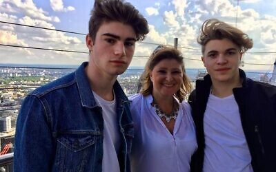 Michelle, with her sons Scott and Oli (right) (Image: The Oli Leigh Trust)