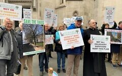 Protesters outside the Royal Courts of Justice in central London ahead of a hearing regarding the UK Holocaust Memorial, an issue that has also divided the Jewish community.