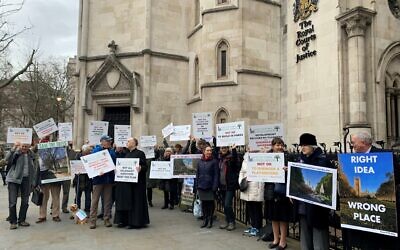 Protesters outside the Royal Courts of Justice in central London ahead of a hearing regarding the UK Holocaust Memorial. The London Historic Parks and Gardens Trust is opposed to a new UK Holocaust Memorial and Learning Centre being built in Victoria Tower Gardens, a small triangular Grade II-listed park next to Westminster Abbey and the Palace of Westminster. Issue date: Tuesday February 22, 2022.