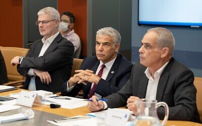 Yair Lapid (centre) at a meeting discussing the situation in Ukraine at Israel's foreign ministry over the weekend (Photo: Twitter)