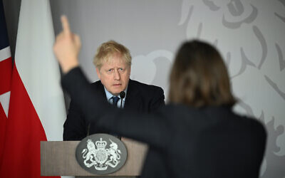 Prime Minister Boris Johnson takes a question from Ukrainian journalist Daria Kaleniuk during a press conference at the British Embassy in Warsaw, Poland after his meeting with Polish Prime Minister Mateusz Morawiecki. Picture date: Tuesday March 1, 2022.