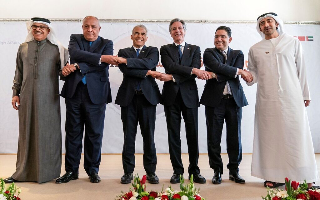 Bahrain's Foreign Minister Abdullatif bin Rashid al-Zayani, Egypt's Foreign Minister Sameh Shoukry, Israel's Foreign Minister Yair Lapid, U.S. Secretary of State Antony Blinken, Morocco's Foreign Minister Nasser Bourita and United Arab Emirates' Foreign Minister Sheikh Abdullah bin Zayed Al Nahyan pose for a photograph during the Negev Summit in Sde Boker on Monday (Photo: Jacquelyn Martin/Pool via Reuters)