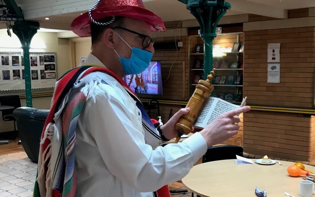 Norwood's Rabbi Stanley Coten reads the megilla for residents at their annual purim party Norwood's Rabbi Stanley Coten reads the megilla for residents at their annual purim party