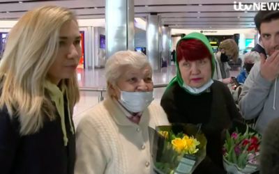 Kateryna Razumenko, 90, centre, alongside daughter Larysa, with, Zac Newman, right, and his wife Katya, left.