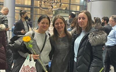 Alona Chugai (left) and Lesia Orshoko (right) pose at Ben Gurion Airport with their Aunt Luba who was already in Israel.