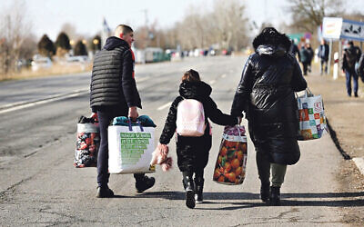 A family flees Ukraine