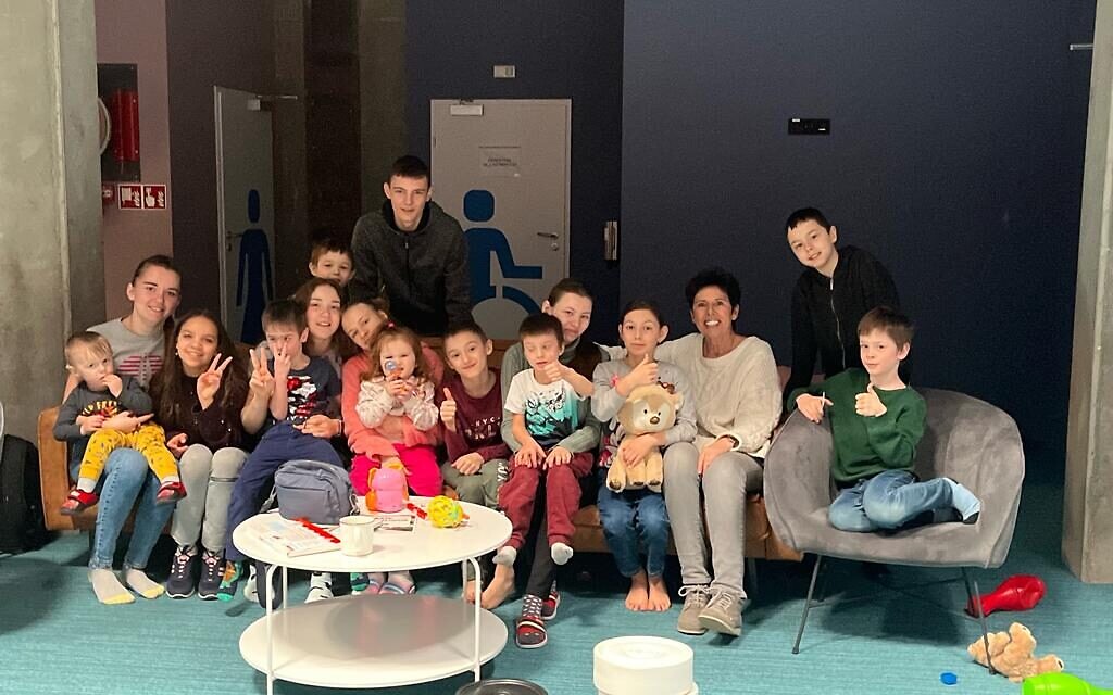 Ukrainian refugees waiting to board a flight to the UK from Poland.