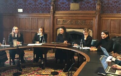 A group of Ukrainian MPs , including People's Deputy of Ukraine Alyona Shkrum (second left) address a select group of British journalists in Westminster on 17 March, 2022.
