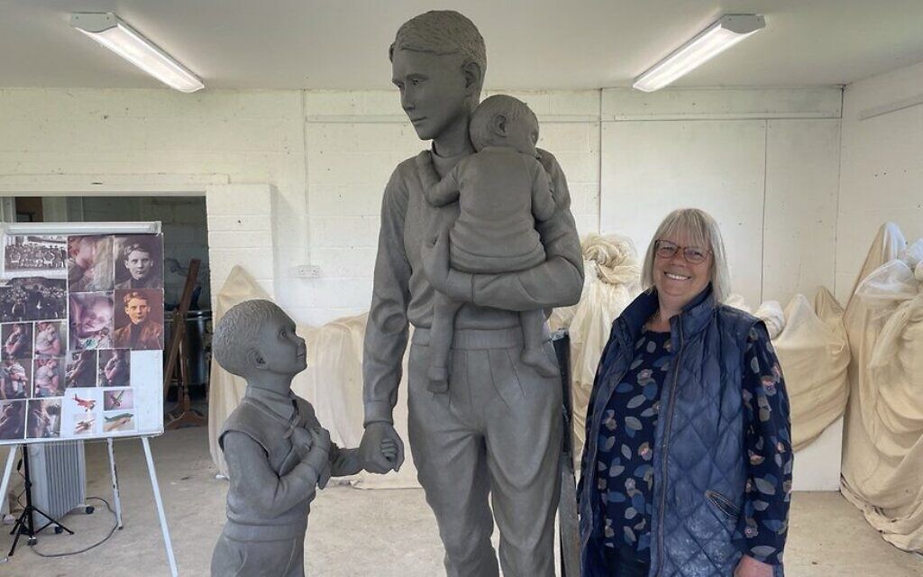 Josephine Jackson from the Trevor Chadwick Memorial Trust with the statue.