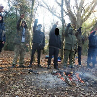 National Action members seen giving Nazi salute in Sevenoaks forest in December 2016 (Photo: West Midlands Police)