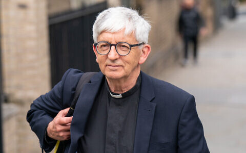 Church of England vicar, Rev Stephen Sizer leaves a disciplinary tribunal at St Andrew's Courtroom, in central London.