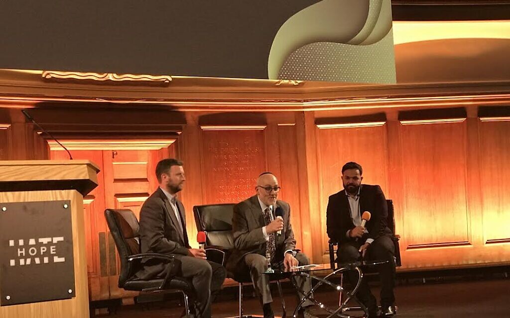Rabbi Harvey Belovski (centre) chats to Azeem Rafiq (left), with Hope Not Hate's Owen Jones, (right).