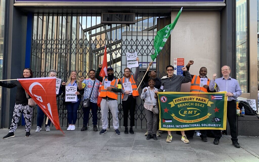 London Underground staff member Daniel Randall, (centre) joins the picket line outside Tottenham Court Road tube station. (picture from his Twitter page).