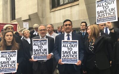 Jonathan Black, (centre) joins barristers on picket line out the Old Bailey