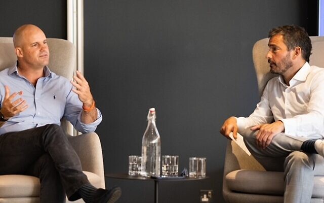 Cricket legend Sir Andrew Strauss (left) in conversation of author and cricket fan Giles Coren - July 2022