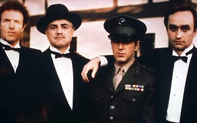 The Godfather stars James Caan, Marlon Brando, Al Pacino and John Cazale.