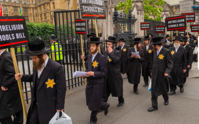 Charedi protesters wearing yellow stars in protest against proposed governmental reform
