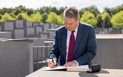Keir Starmer signs guest book at Berlin's Memorial to the Murdered Jews of Europe