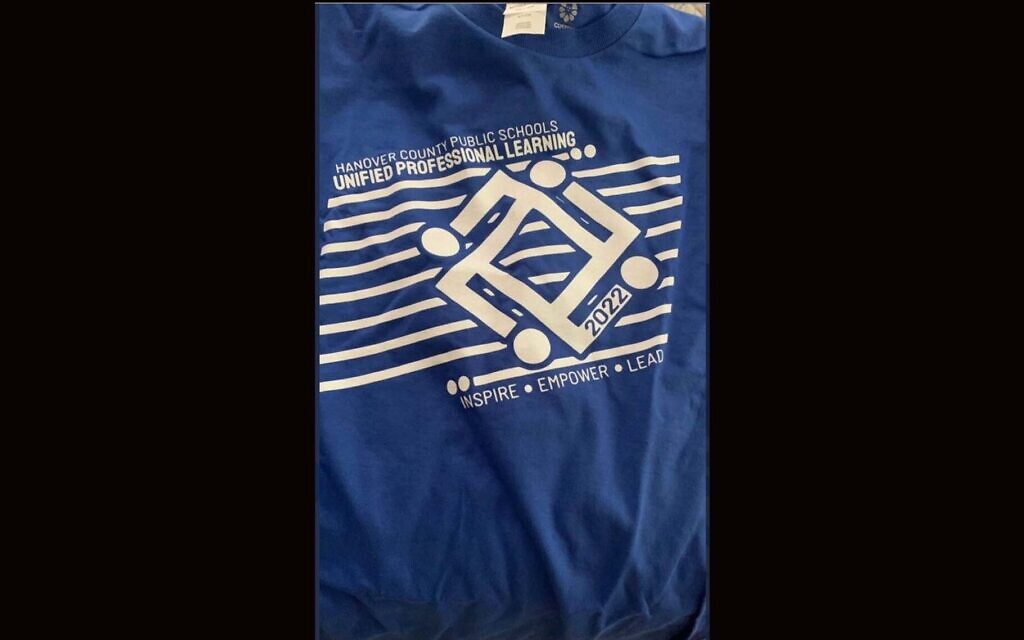 A t-shirt distributed at a conference for Hanover County Public Schools outside Richmond, Virginia, displaying a logo that resembles a swastika (Photo: Twitter)