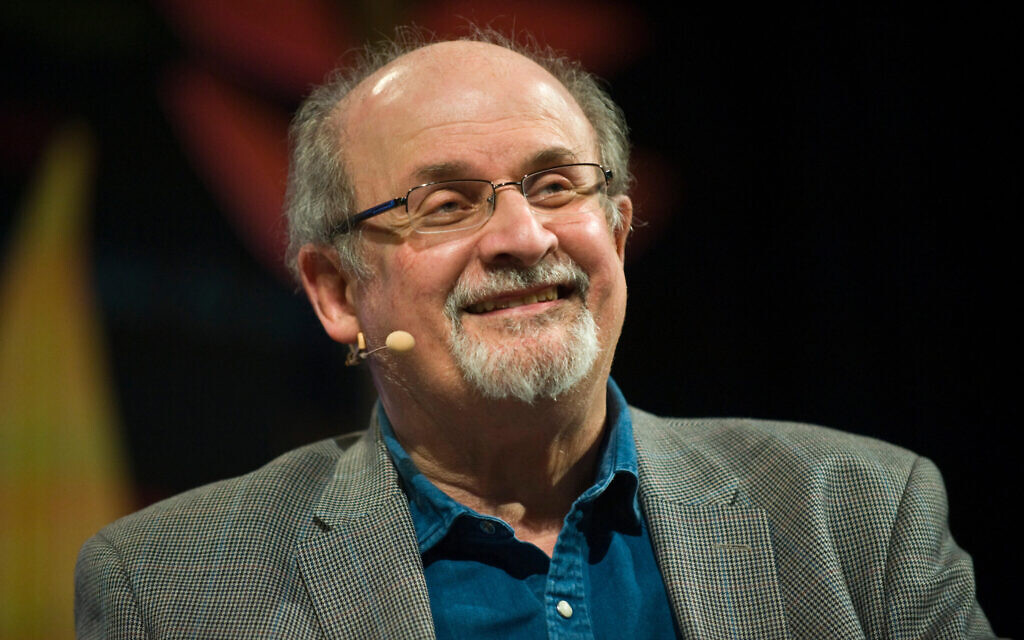 Salman Rushdie speaking on stage at festival in Wales in 2018 (Photo: Alamy)