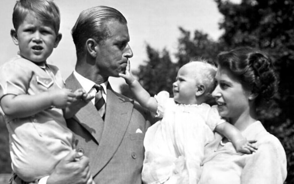 The infant King Charles (right) with his family.