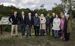 The Thaxted AJR of Thaxted Tree Planting, September 2022. Left to right: Tom Magness (farmer); Aviv Handler (grandson of Arieh Handler); Danny Handler; Alan Philipp (grandson of Oscar Philipp), Verity Steele; George Magness (farmer); Colin Magness (farmer); Debra Barnes (AJR); Mike Levy (historian); Chaya Rivlin (lived on the farm as a young child); Bruce Munro (Thaxted historian). Pic cap: Adam Soller Photography