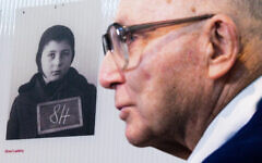 Holocaust survivor and Israeli sportsman Shaul Ladany stands in front of a child photo of him in the Bergen-Belsen concentration camp memorial. Holocaust survivor and Israeli sportsman Shaul Ladany stands in front of a child photo of him in the Bergen-Belsen concentration camp memorial.