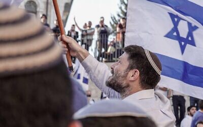 Jerusalem, Israel. 15th, June 2021. Parliament Member BEZALEL SMOTRICH of the Religious Zionism Party joins thousands identifying with the nationaloist religious Zionist streams marching in the annual Dance of Flags March from downtown Jerusalem to the Damascus Gate, Jaffa Gate