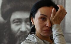 2J19C6N Ukrainian Jew Irina Sakada from Kyiv, reacts as she listens to her daughter Sophia during a meeting with refugees organised by The Jewish Federations of North America, amid Russia's invasion of Ukraine, at Chachmei Lublin Yeshiva Synagogue in Lublin, Poland March 22, 2022. Picture taken March 22, 2022. REUTERS/Kacper Pempel 2J19C6N Ukrainian Jew Irina Sakada from Kyiv, reacts as she listens to her daughter Sophia during a meeting with refugees organised by The Jewish Federations of North America, amid Russia's invasion of Ukraine, at Chachmei Lublin Yeshiva Synagogue in Lublin, Poland March 22, 2022. Picture taken March 22, 2022. REUTERS/Kacper Pempel