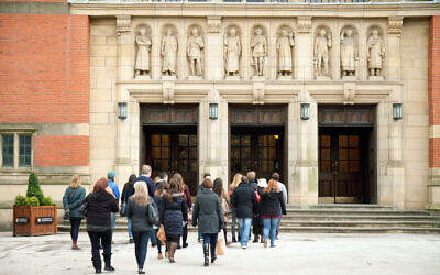 University of Birmingham students; Students walking in Chancellors Court, Edgbaston campus, Birmingham university UK - Image ID: D4J3CP