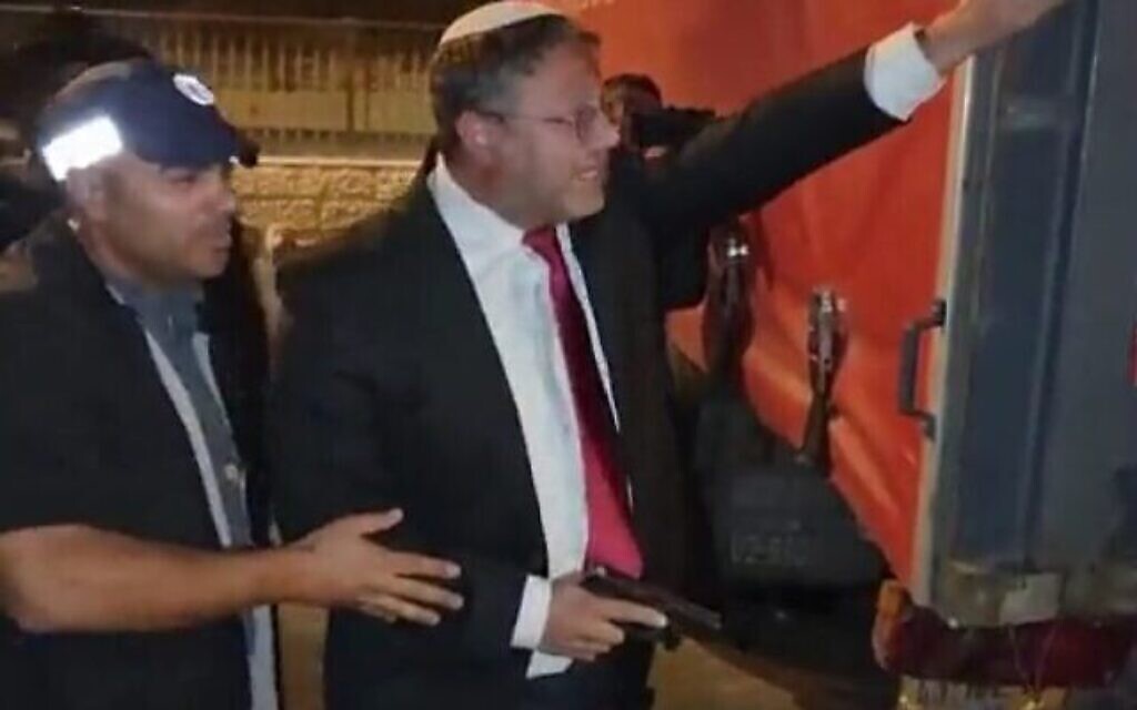 MK Itamar Ben Gvir brandishing a handgun during clashes in East Jerusalem on October 13.