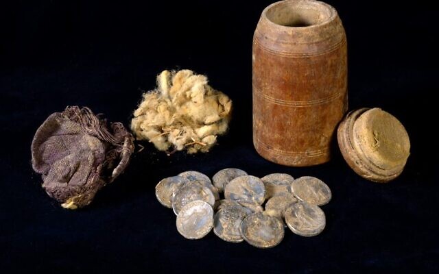 The silver coins found in a wooden box in a cave in the Judean Desert. Photo: Dafna Gazit, Israel Antiquities Authority