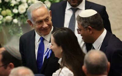 Israeli designate Prime Minister Benjamin Netanyahu in conversation with right-wing Knesset member Itamar Ben Gvir during the swearing-in ceremony for the new Israeli parliament.