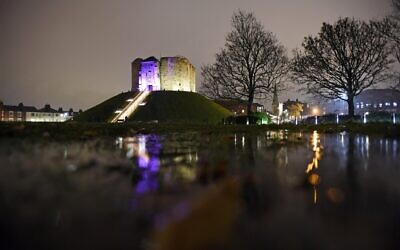 Clifford’s Tower in York is illuminated to mark Chanukah, the festival of lights.
Credit: Guzelian Photography