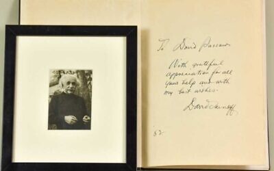 Lot 376: Albert Einstein (1879-1955) - signed black and white photograph, 3.25ins x 2.25ins, framed and glazed, and David Sarnoff - "Progress in Electronics", with presentation inscription dated 1952, one volume
(Credit: The Canterbury Auction Galleries)