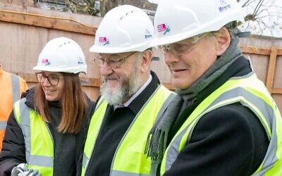JBD Chief Executive Lisa Wimborne, Chief Rabbi and Dr Mathew Offord starting the concrete pour.