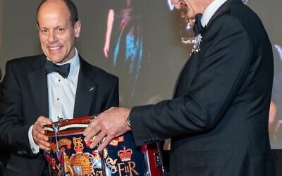 The Royal Marines Association CEO Jonathan Ball presented Keith Breslauer with a HM Royal Marines Band side-drum during this year’s  Guildhall Dinner in London.